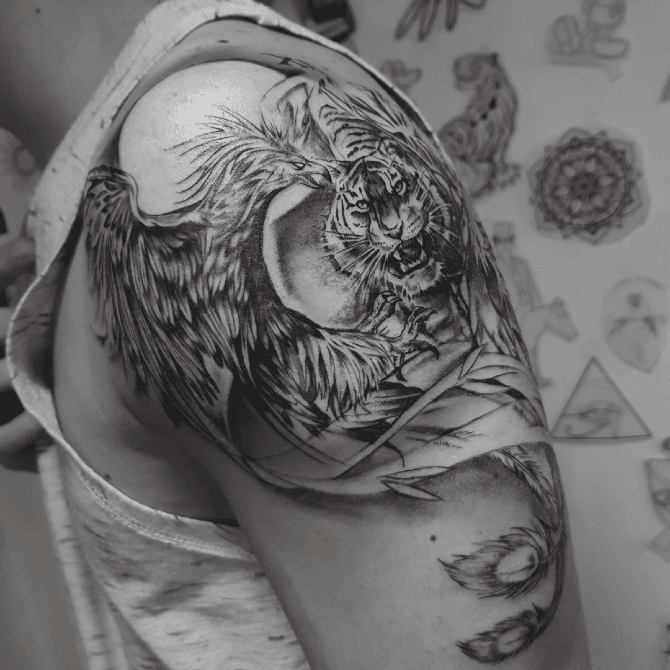Tattoo uploaded by Jones • Phoenix bird vs tiger. #phoenix #tiger #tattooart #Tattoodo • Tattoodo