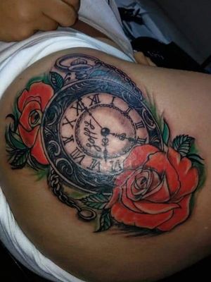 Reloj y rosas 
