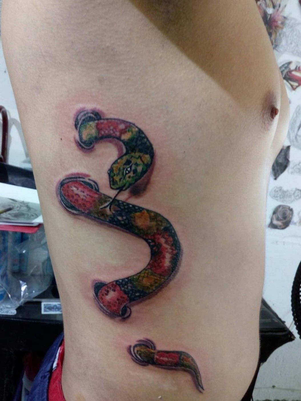 Bailey Hunter Robinson  Rattle snake sssssss Tattooed this one the other