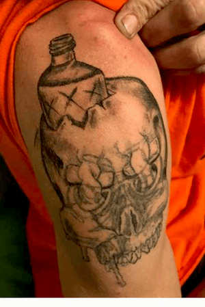 Start of one helluva rework/coverup #freehand top skull with the bottle phase one