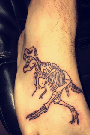 Kid wanted me to get a trex tattoo, so i gotta trex tattoo. #trex #dinosaur #foottattoo #skeleton #dinosaurtattoo 