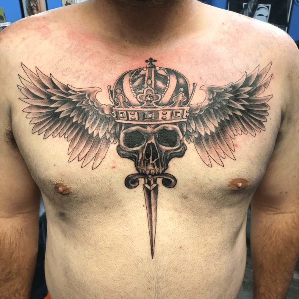 skull wings back tattoo