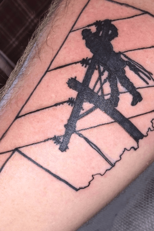 This linemans tattoo His team had just finished restoring power Down  East   rNorthCarolina