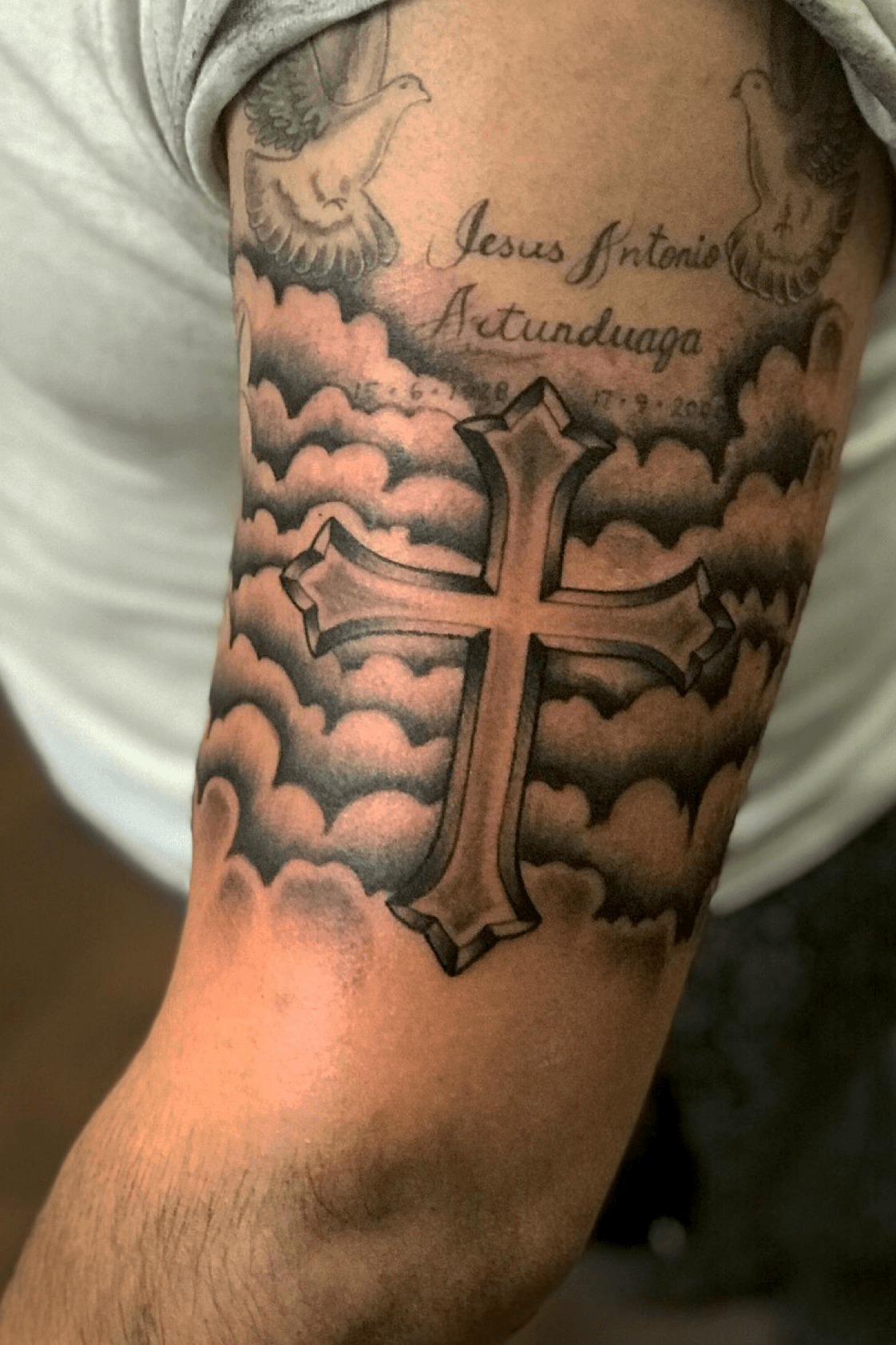 Cross tattoo with clouds Sleeve tattoo on Stylevore