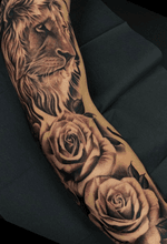 Detail of the lion and roses on my arm, done by joseph passion 