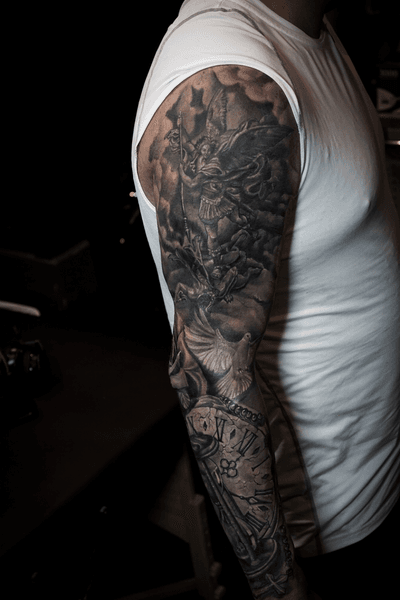 Black and g rey tattoo sleeve