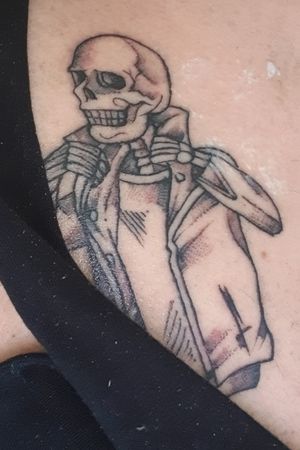 Skull rock and roll tattoo