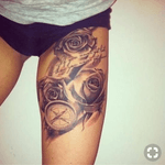 Compass floral roses thigh tattoo