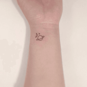 Small space universe tattoo