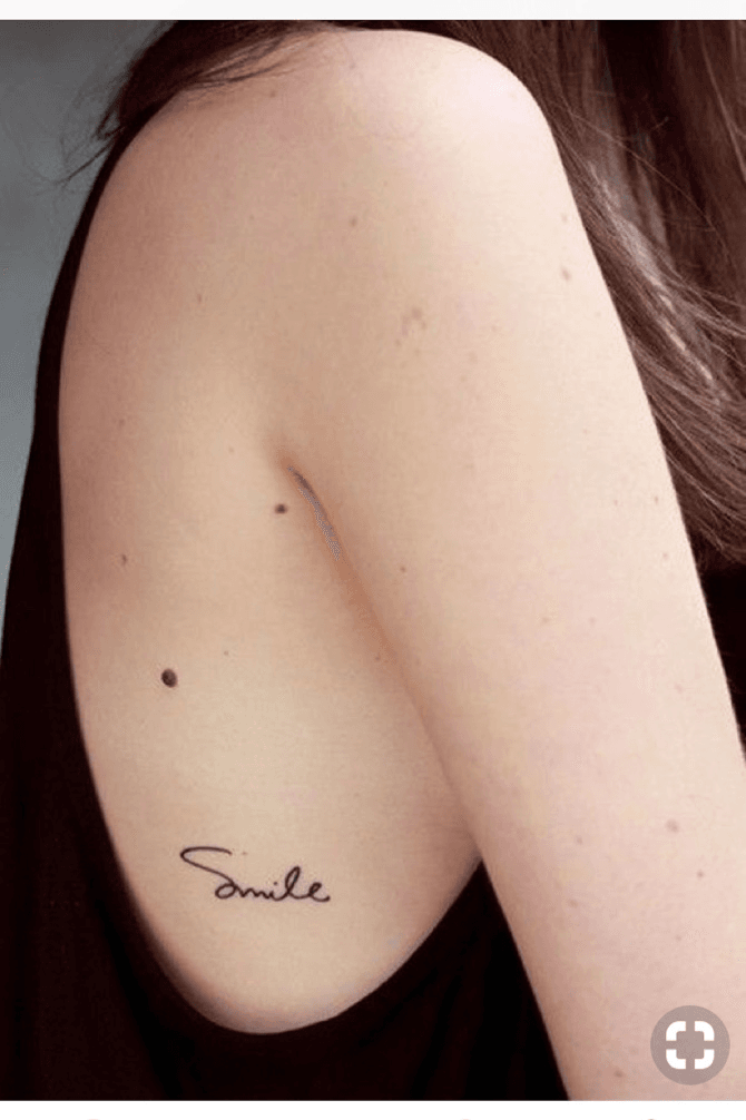 Share 81+ smile quote tattoos