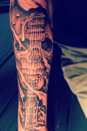 Artwork by: Justin Wheelright                              Gretsch pro jet incorperated with a skull 