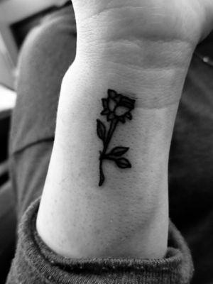 Small rose wrist tattooFusion Ink