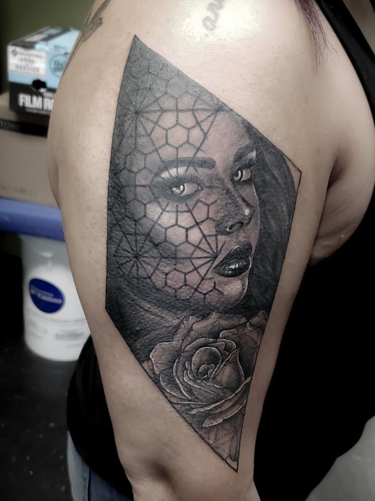 Grey Ink Geometric Tattoo On Man Face