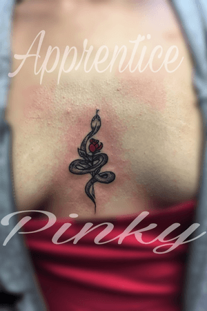 Sternum snake and rose tattoo 