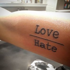 My fourth tattoo: love over hate.