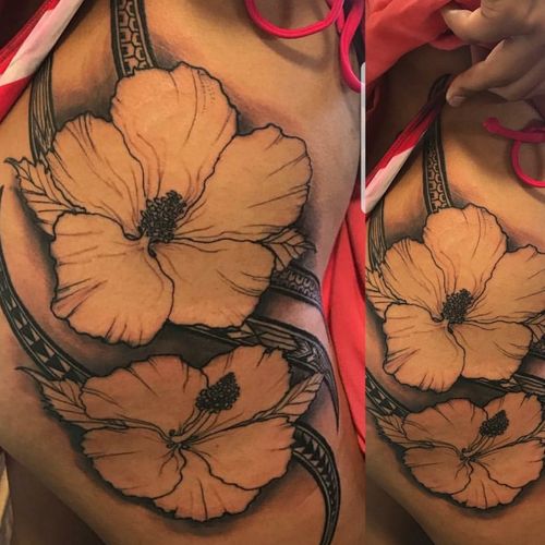 Freehand polynesian  tattoo hawaiian style with the tropical hibiscus flowers native to hawaii