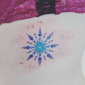 Colored Snowflake on ribbing.#tattoo #snowflake ##color #colortattoo #black #linework #line #michiyo #michiyo_bulle