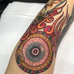 Tattoo by Alfredo Guarracino #AlfredoGuarracino #eyetattoos #eyetattoo #eye #psychedelic #surreal #strange #color #fire #Ouroboros #snake #reptile