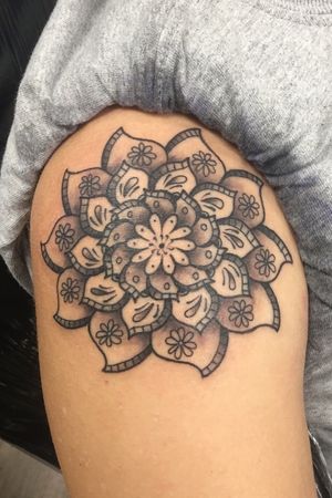 Black and grey mandala done on arm 