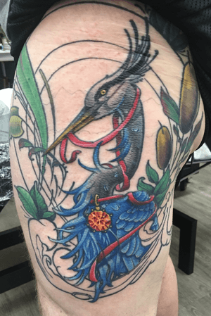 Progress shot of a thigh tattoo project. The blue heron, gemstone, and res ribbon are fresh with the rest healed. 