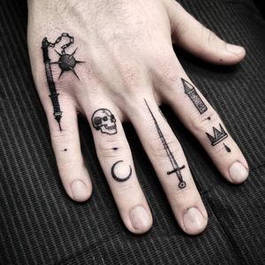 Tattoo by Thomas E #ThomasE #fingertattoos #fingertattoo #finger #hand #mace #skull #moon #sword #castle #crown #blood #dotwork #illustrative