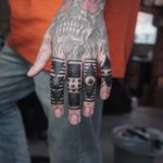 Tattoo by James Lau #JamesLau #fingertattoos #fingertattoo #finger #hand #blackwork #tribal #shapes #linework #dotwork
