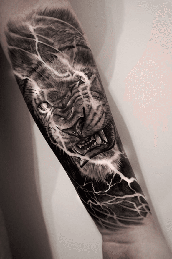 Tattoo uploaded by Leighton Nicholls • My first peice, wanted a  possessed/all powerful king of the jungle on my arm as i'm a Leo (August  born). Very satisfied with the outcome of