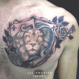 Lion shield resting on roses tattoo made by me at the Black Box Studio. The lion das already there before.#shield #lion #rose #roses #blackandgray