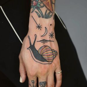 Tattoo by Patryk Hilton #PatrykHilton #snailtattoos #snailtattoo #snail #animal #nature #illustrative #moon #star #landscape #handtattoo #hand