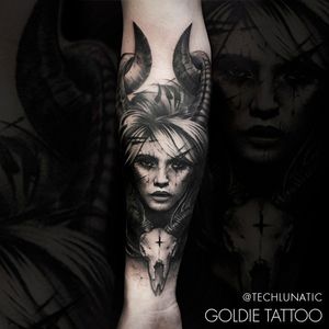 Tattoo by Goldie tattoo