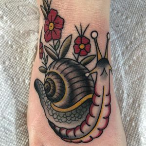 Tattoo by Chris Stuart #ChrisStuart #snailtattoos #snailtattoo #snail #animal #nature #color #traditional #flower