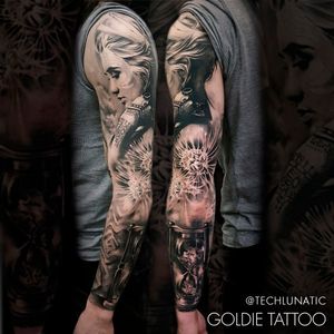 Tattoo by Goldie tattoo