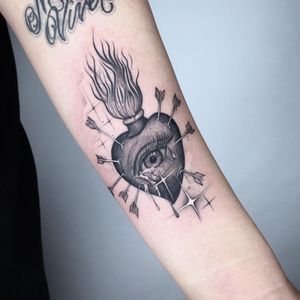 Tattoo by Alan Chen #AlanChen #sacredhearttattoos #sacredhearttattoo #sacredheart #heart #fire #love #religious #blackandgrey #illustrative #sparkle #tears #arrows
