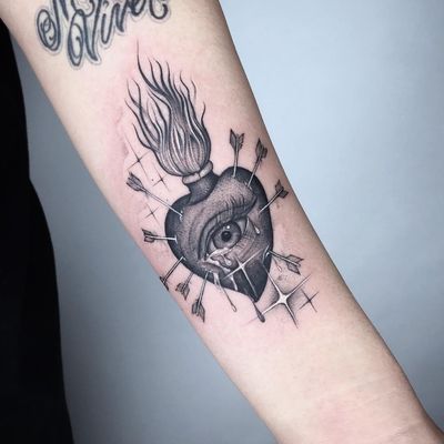 Tattoo by Alan Chen #AlanChen #sacredhearttattoos #sacredhearttattoo #sacredheart #heart #fire #love #religious #blackandgrey #illustrative #sparkle #tears #arrows