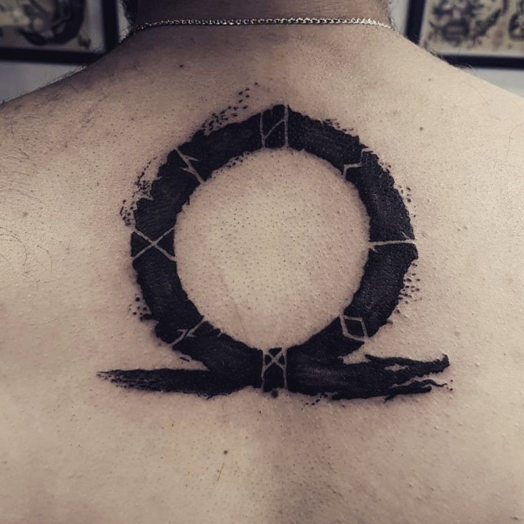 omega symbol tattoo meaning