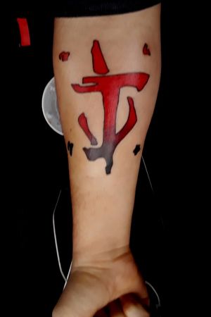 The mark of the demon slayer from the "DOOM" video game franchise. Done by Sang at action tattoo in Auburn, WA. His Instagram is @artbysang Great lights, steady hand, and light handed. Did a great job on this for being my first tattoo and did great on my wife's as well. 