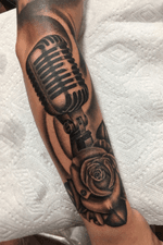 Black and grey Microphone and rose 