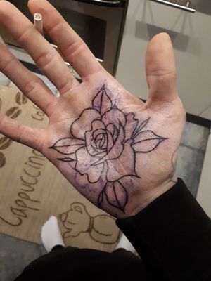 Handpalm rose tattoo