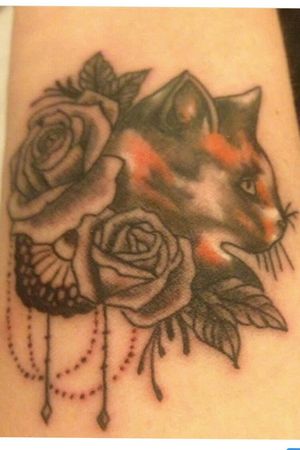 Cat tattoo wrist piece 