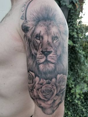 Lion arm tattoo 