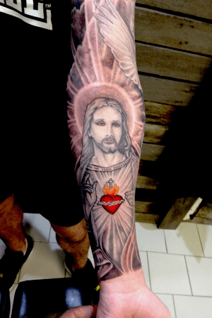 Religious sleeve and chest composition.