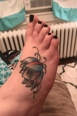 Floral tattoo on my wifes foot 