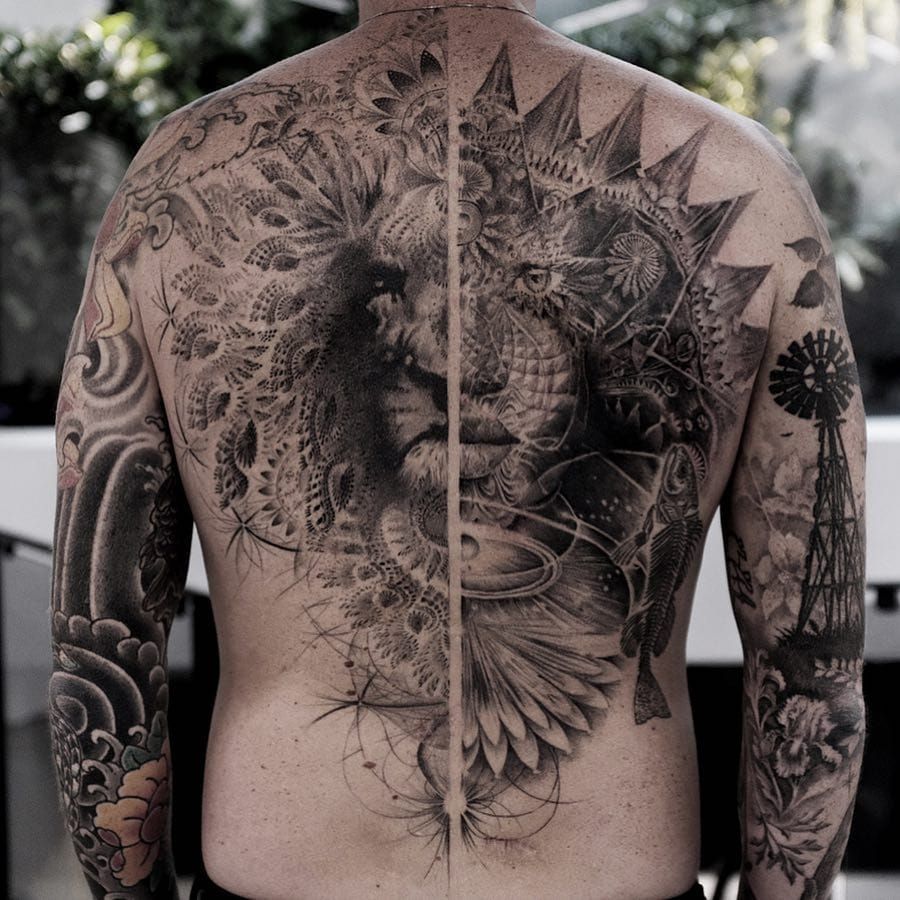 Tattoo uploaded by Tattoodo • Tattoo by Balazs Bercsenyi #balazsbercsenyi  #splitfacetattoos #portrait #surreal #strange #face #blackandgrey #lion  #fractals #shapes #animals #nature #floral #flowers • Tattoodo