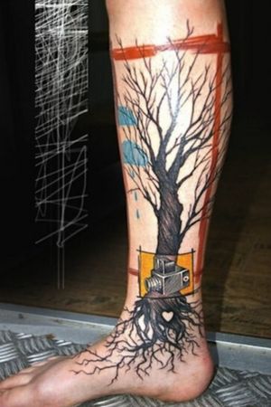 Tree with no leaves and a camera on the leg #tree #camera #legtattoo #ankle 