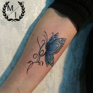 This butterfly is a little cover up of another tattoo, it means freedom and reborn for my customer