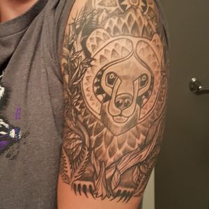 Bear tattoo.