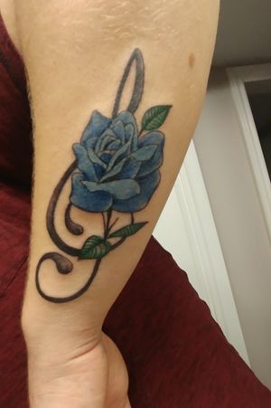 Blue rose with Treble cleff.