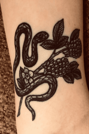 Small snake and berries by Jack Ankersen. Done at Nothing Tattoo, Stockholm.