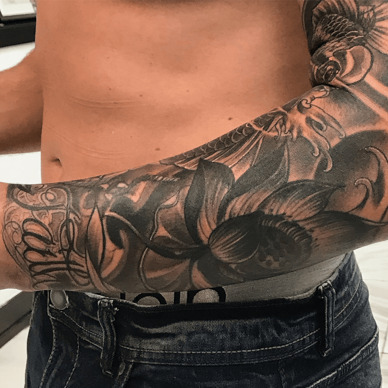 flower tattoos for men half sleeves