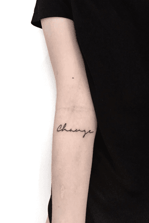 My first tattoo. It says "Change" because I think that everything happens for a reason and everthing brings change. So no matter which way you choose there will always be change. Every decision in life brings change and there are no bad decisions. 